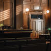 Empty courtroom showing judge's bench 